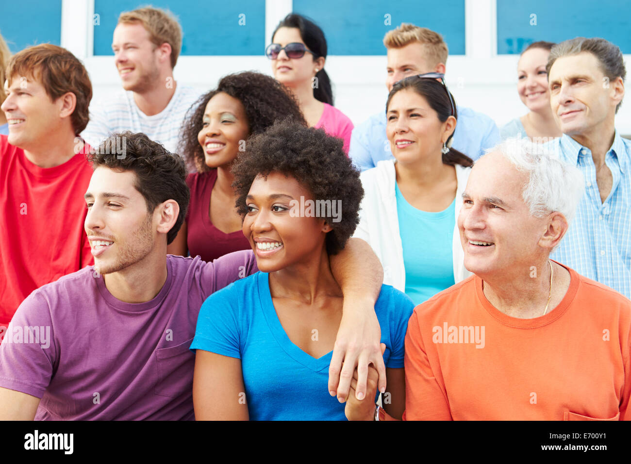 Crowd Of Spectators Watching Outdoor Sports Event Stock Photo