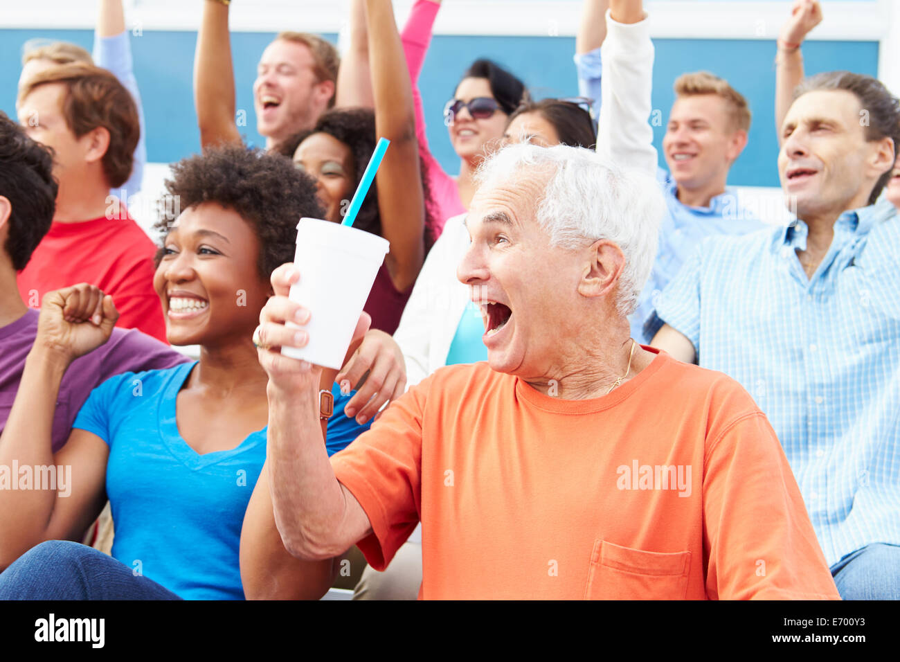 Spectators Cheering At Outdoor Sports Event Stock Photo Alamy