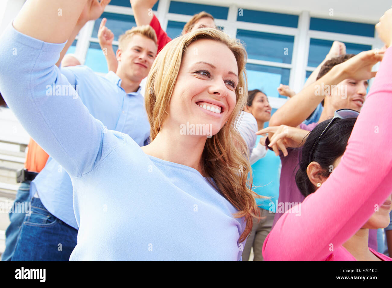 Audience Dancing At Outdoor Concert Performance Stock Photo