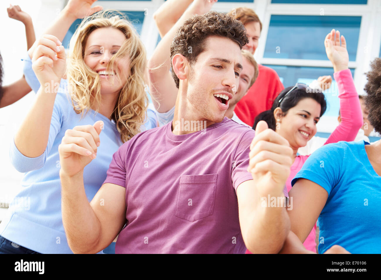 Audience Dancing At Outdoor Concert Performance Stock Photo