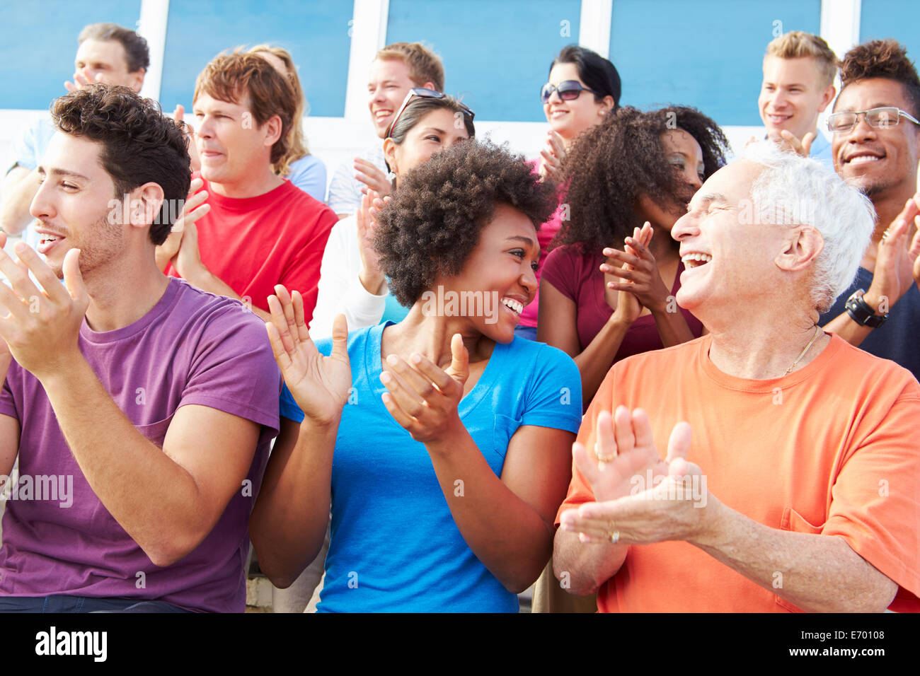 Audience Applauding At Outdoor Concert Performance Stock Photo