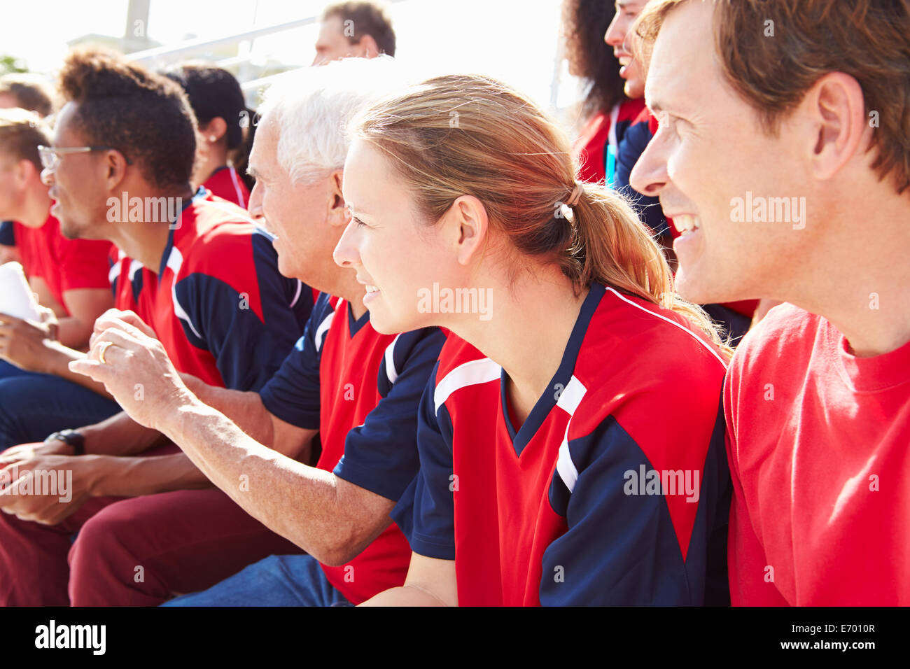 Spectators In Team Colors Watching Sports Event Stock Photo