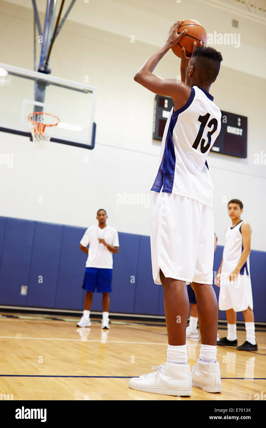 Male High School Basketball Player Shooting Penalty Stock Photo