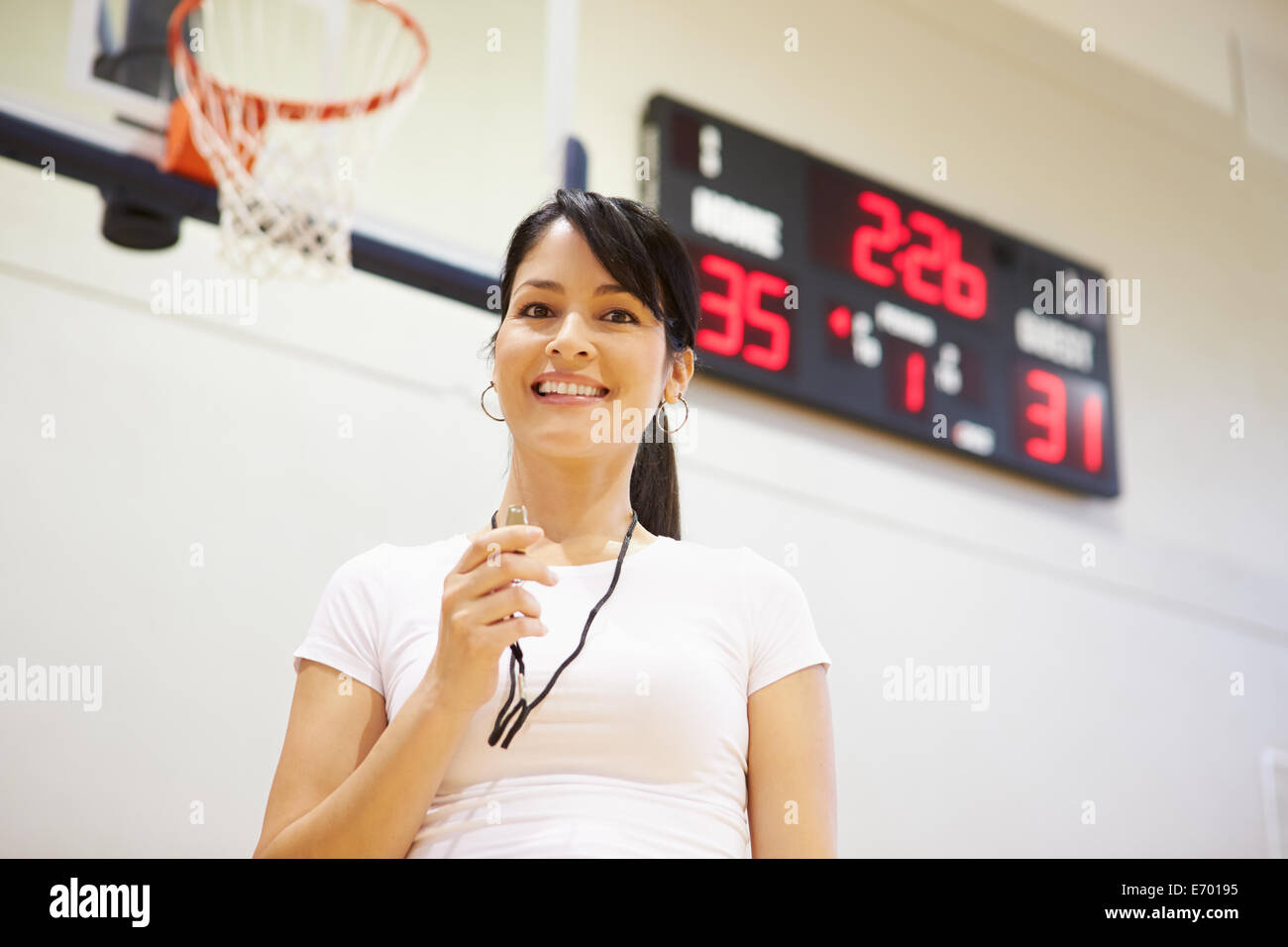 Female Coach Of High School Basketball Team Stock Photo Alamy