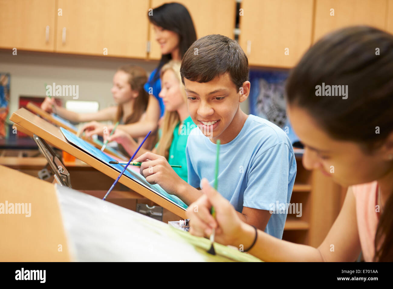 Male Pupil In High School Art Class Stock Photo - Alamy