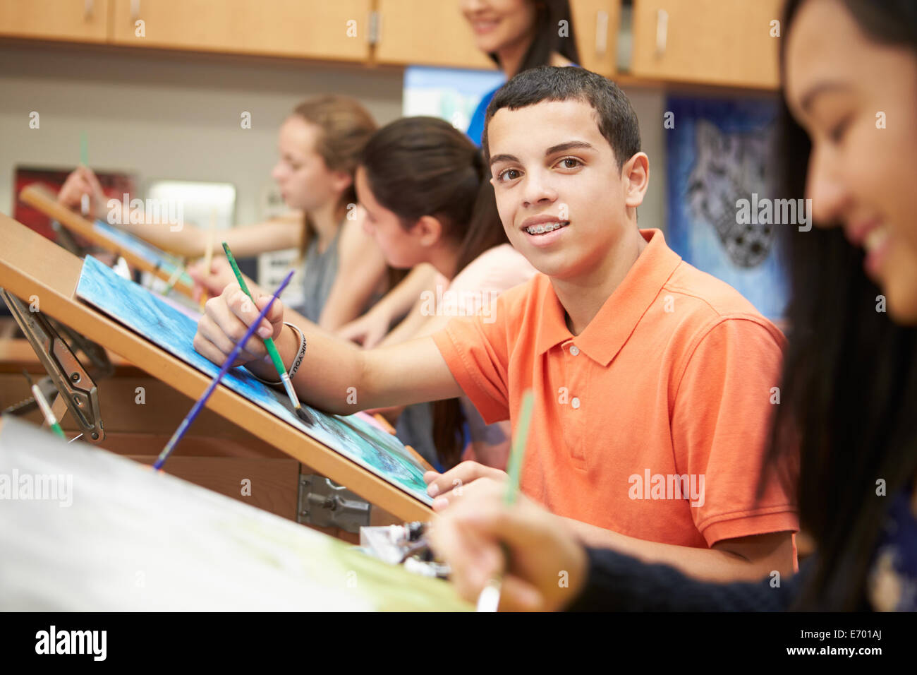 Male Pupil In High School Art Class Stock Photo - Alamy