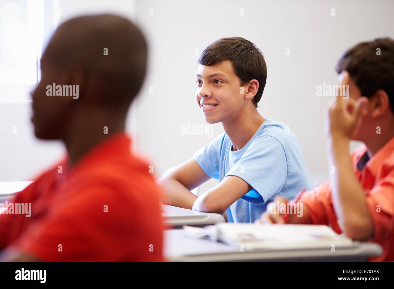 Male High School Pupil In Class Stock Photo