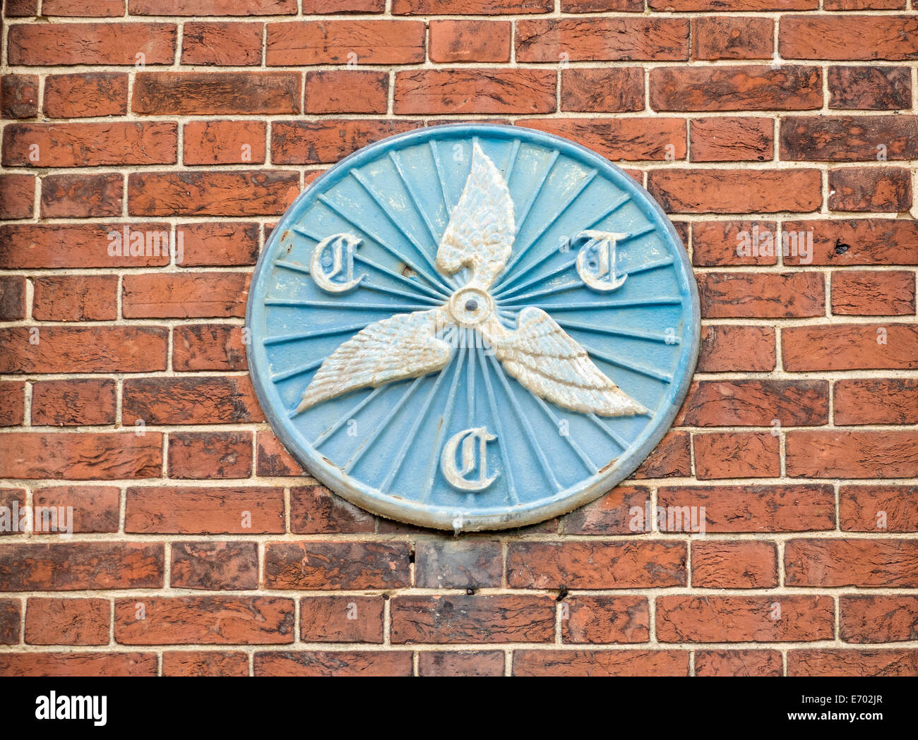 Old Cyclist Touring Club sign on the wall of a hotel in Cley Next the sea, Norfolk, UK. Stock Photo