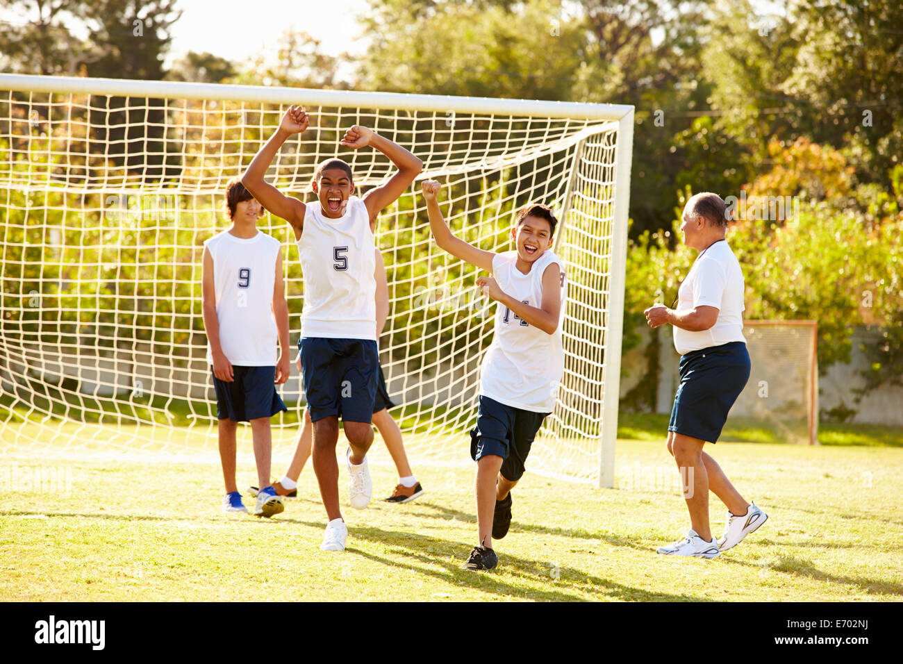 player-scoring-goal-in-high-school-soccer-match-stock-photo-alamy