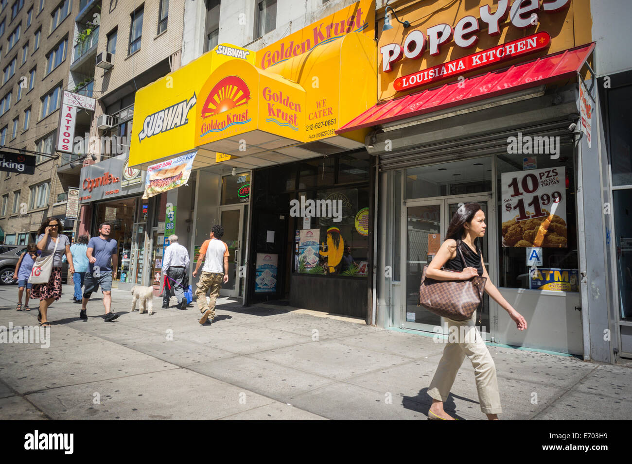 A branch of the Golden Crust restaurant is seen amidst other fast food