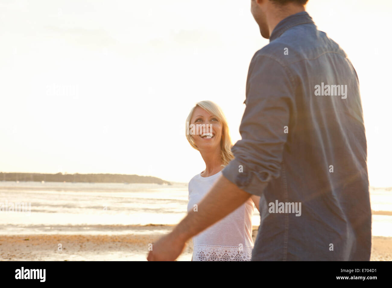 Young couple enjoying beach Stock Photo