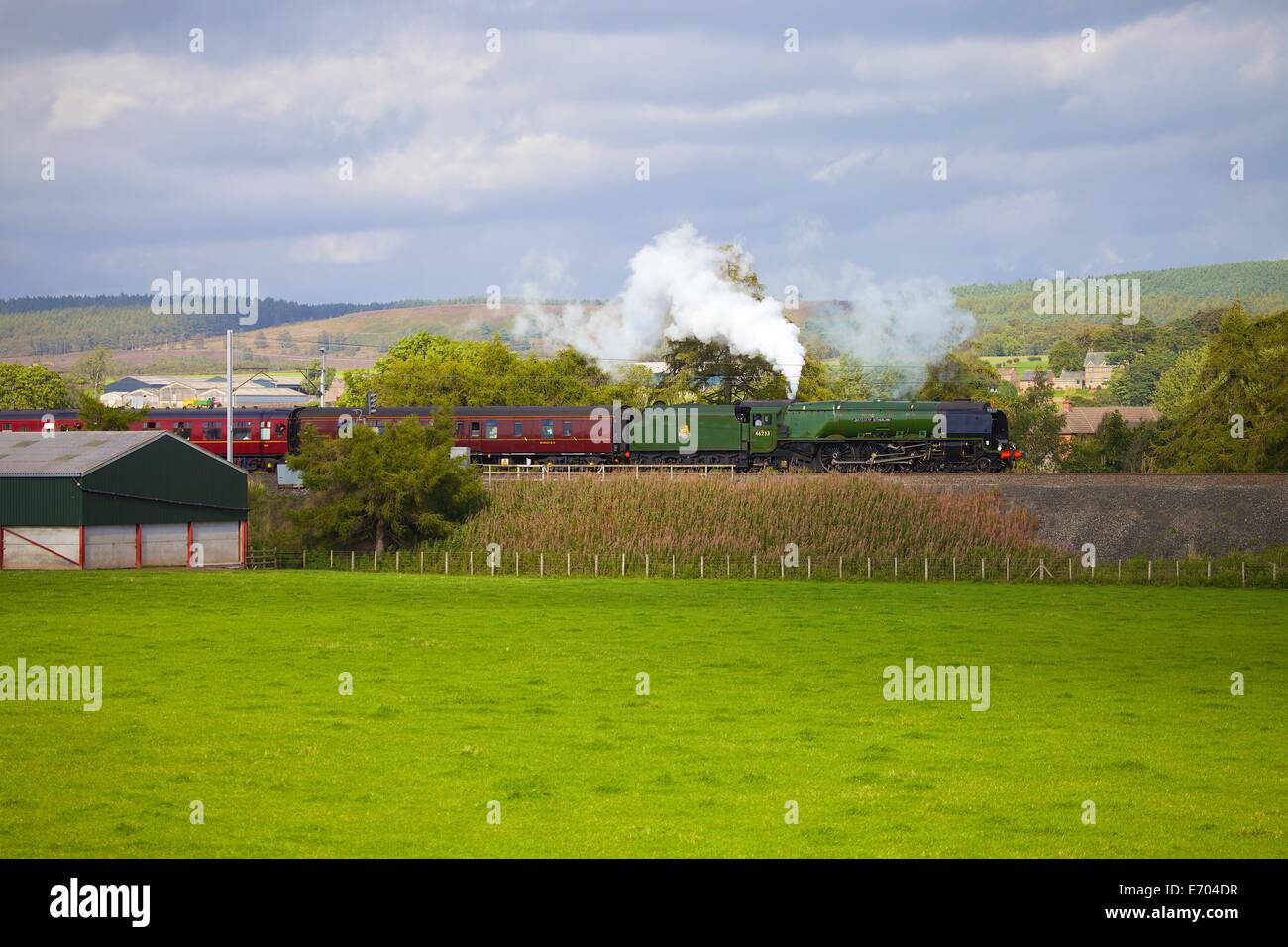 Steam locomotive LMS Princess Coronation Class 46233 'Duchess of Sutherland' near Plumpton, Cumbria, England, United Kingdom. Stock Photo