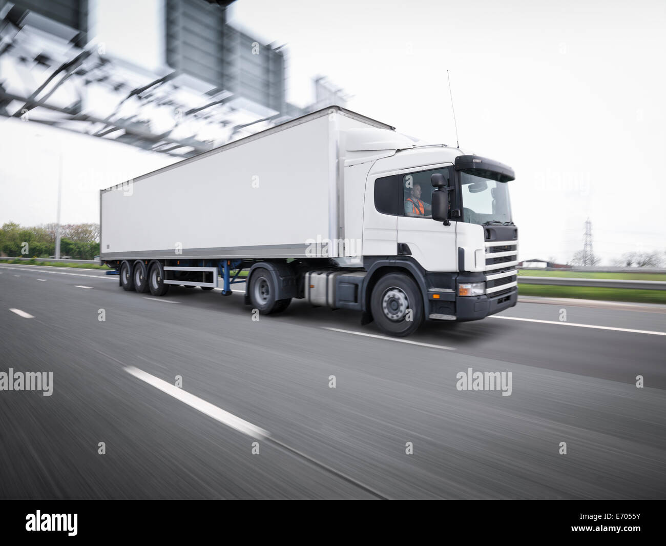 Freight truck on the move on motorway Stock Photo