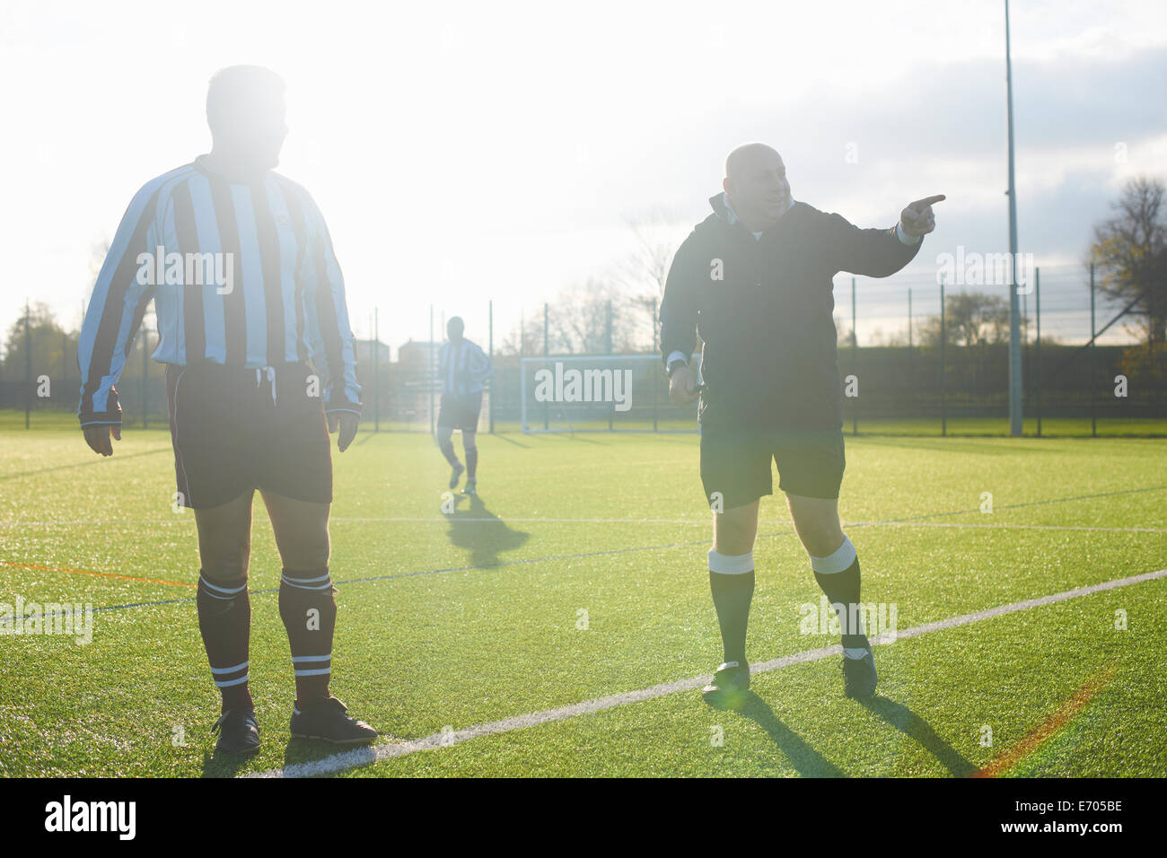 Football players starting game Stock Photo Alamy