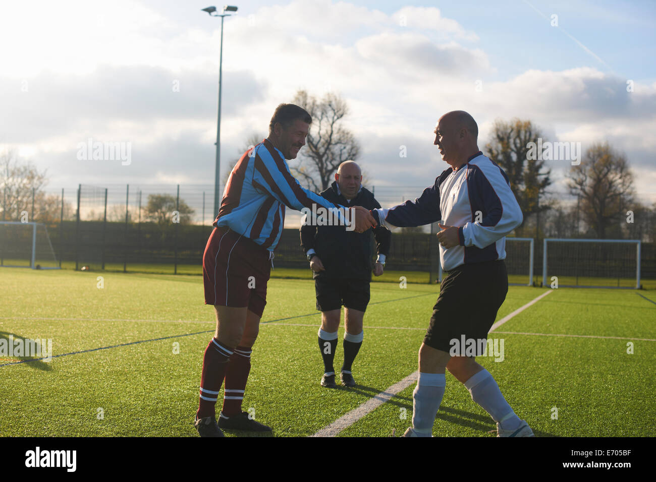 Football players starting game Stock Photo Alamy