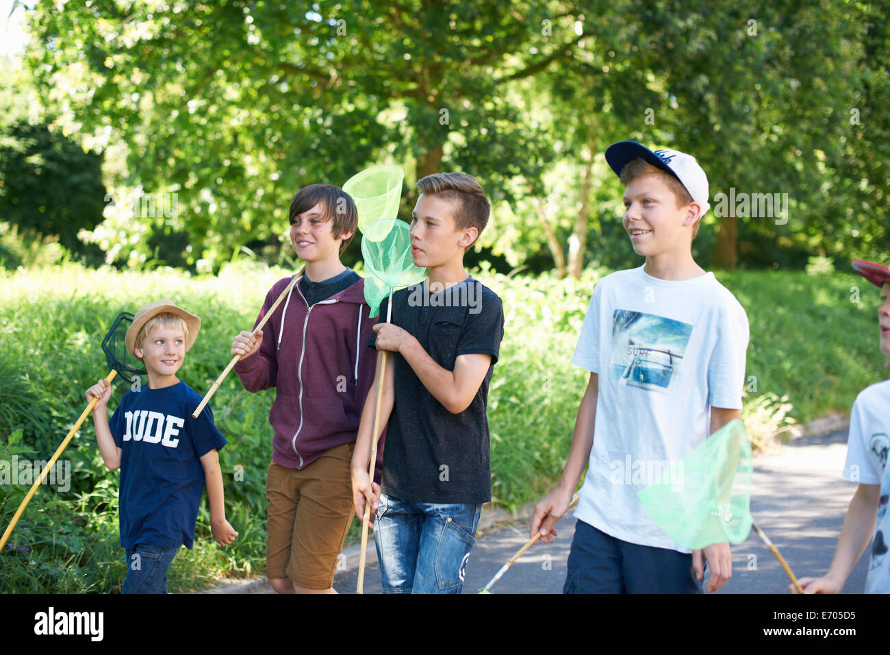 Group of boys with fishing nets Stock Photo