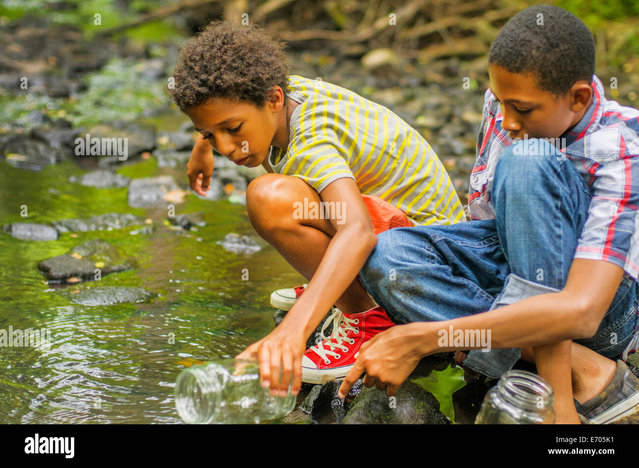 Boys Catching Fish High Resolution Stock Photography and Images Alamy