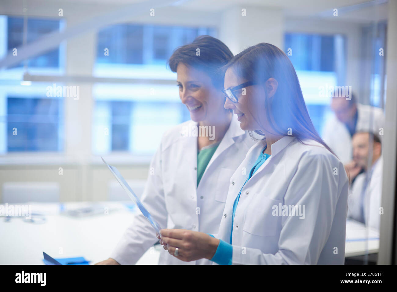 Two doctors looking at x-ray Stock Photo