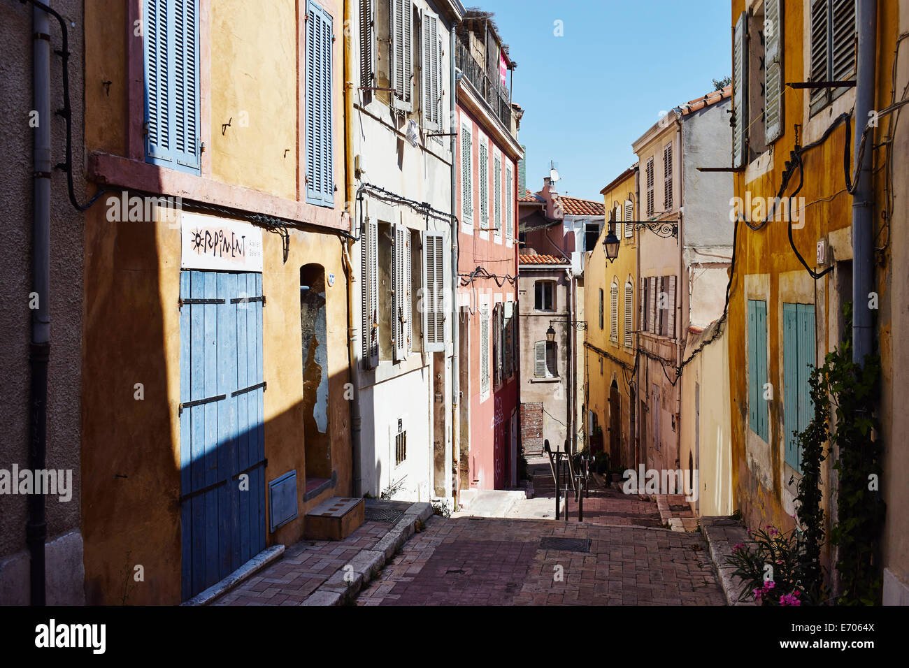 Colorful house exteriors along alleyway, Marseille, France Stock Photo