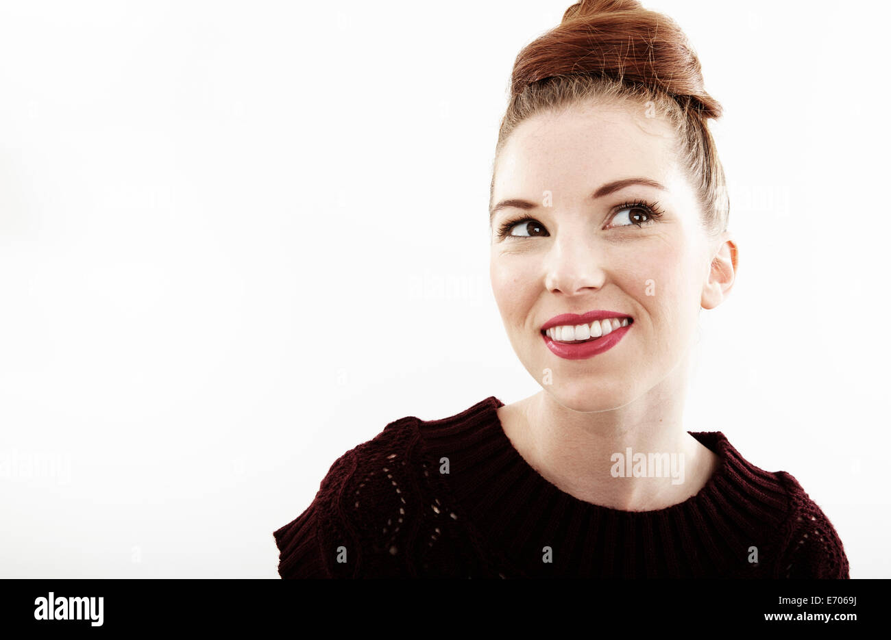 Studio portrait of smiling beautiful young woman Stock Photo - Alamy