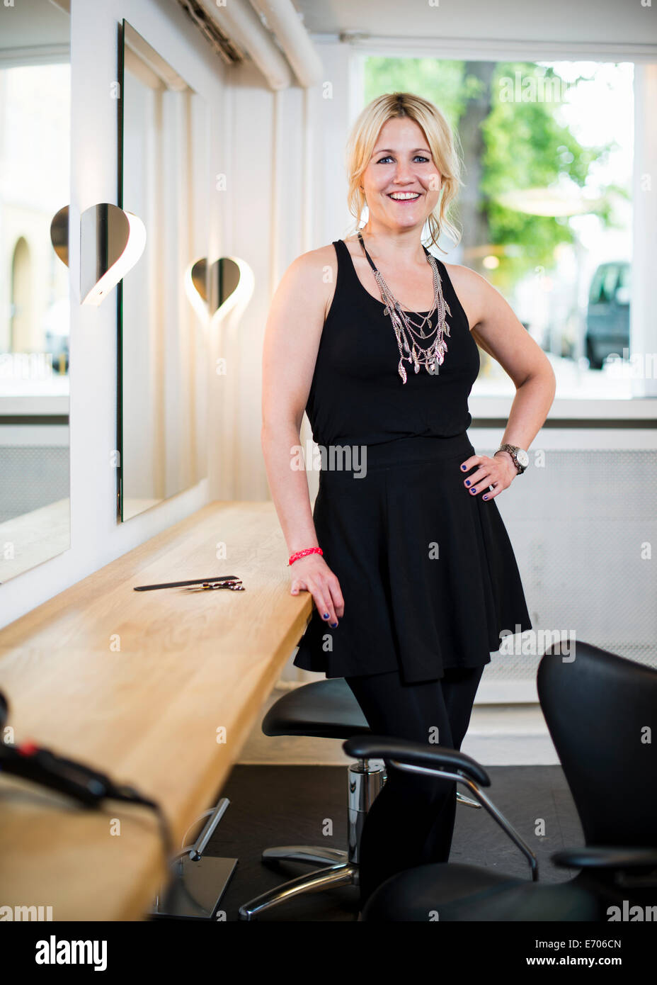 Female business owner in hair salon, portrait Stock Photo