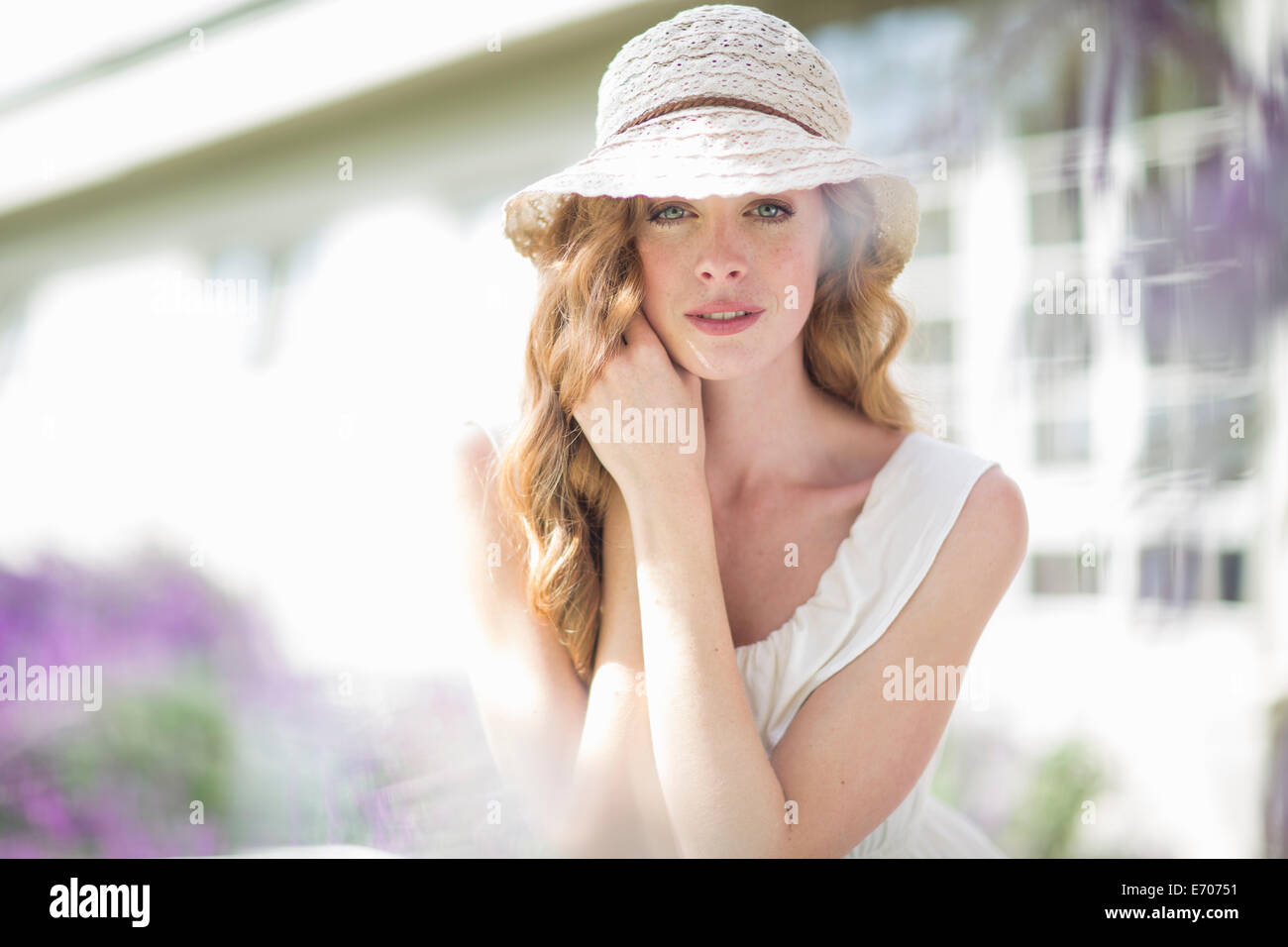 Portrait of beautiful young woman in garden Stock Photo - Alamy