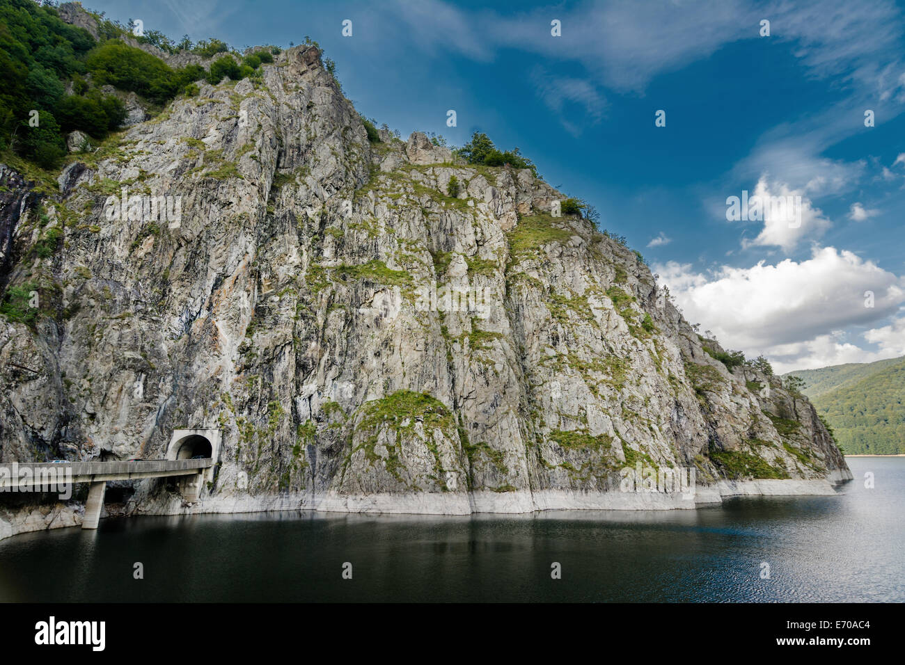 You can easily reach Vidraru Lake by following the Transfagarasan Rode. Vidraru Lake has an aria of 893 hectares and it is 155 m Stock Photo