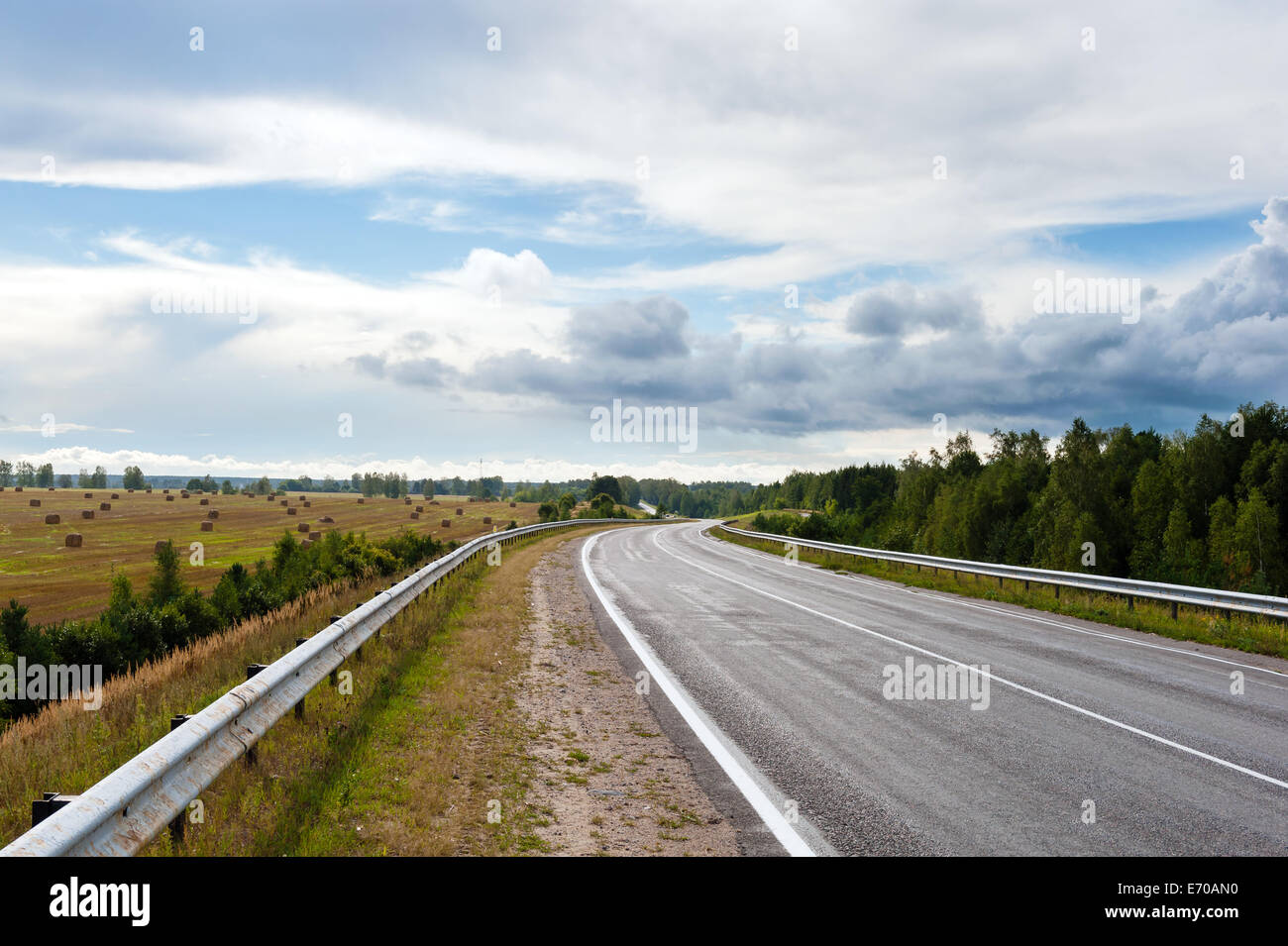 asphalt road through the fields Stock Photo - Alamy