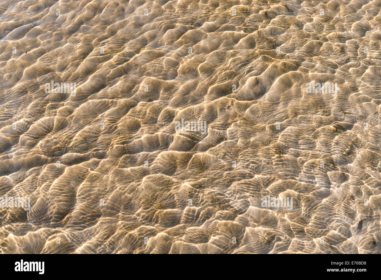 Clear water ripples on sandy beach, Noordhoek, cape Town, South Africa Stock Photo