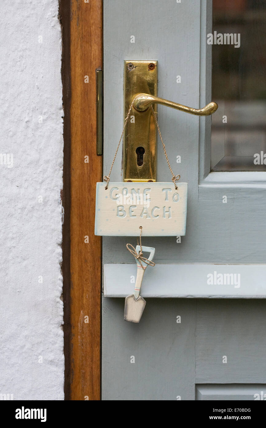 Gone to the Beach sign on the front door of a house. Stock Photo