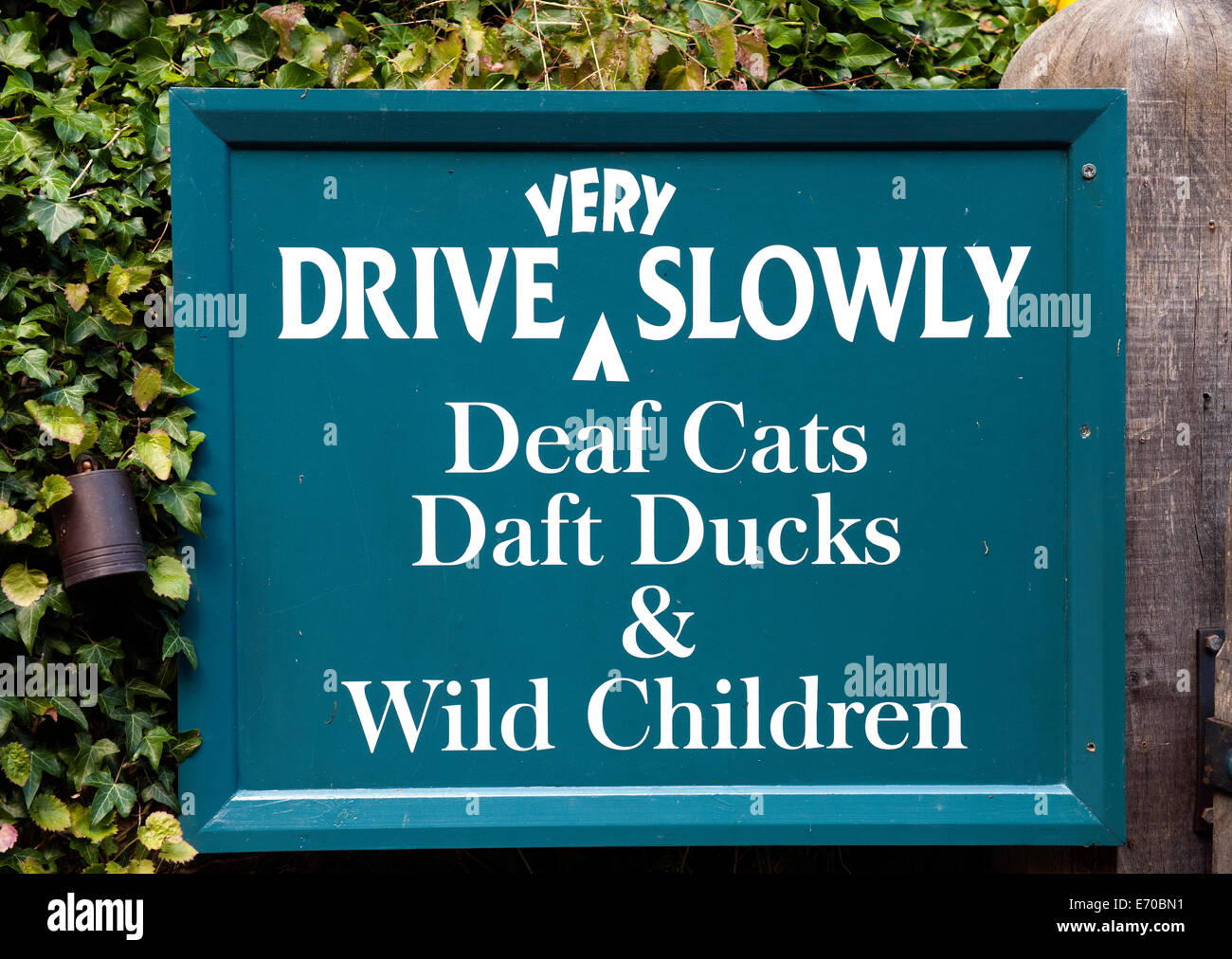 Warning sign for motorists to drive very slowly. Stock Photo