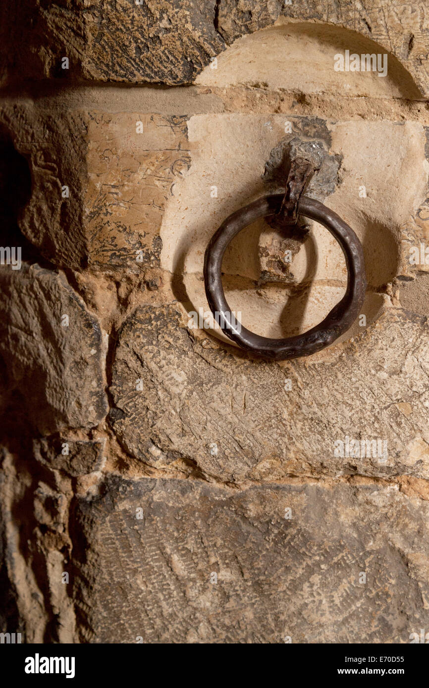 Castle dungeon UK; Medieval shackle or manacle in the 12th century dungeons, Lincoln Castle, Lincoln Lincolnshire UK Stock Photo