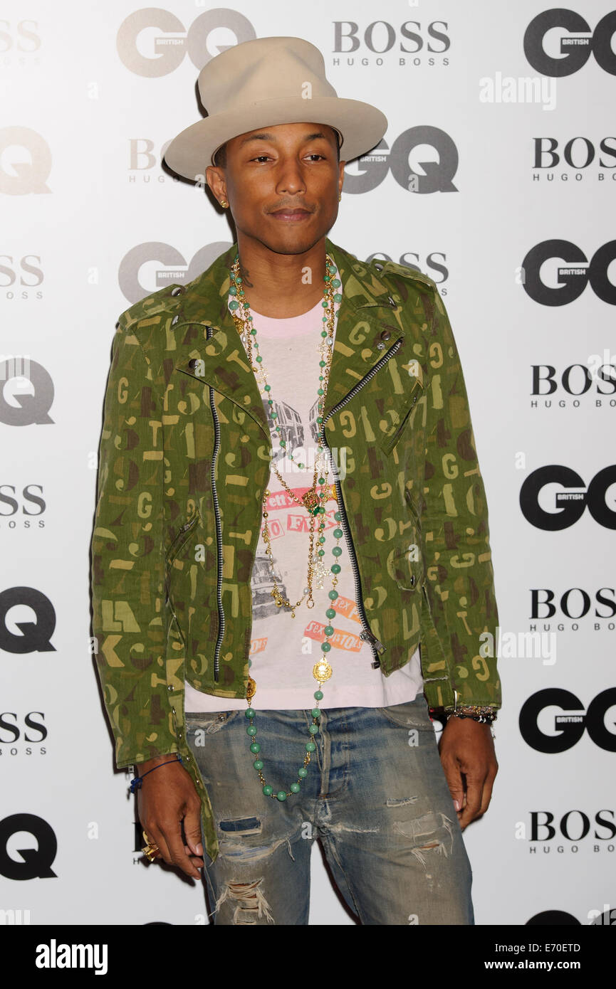 Pharrell Williams arrives for the GQ Men Of The Year Awards 2014. Stock Photo