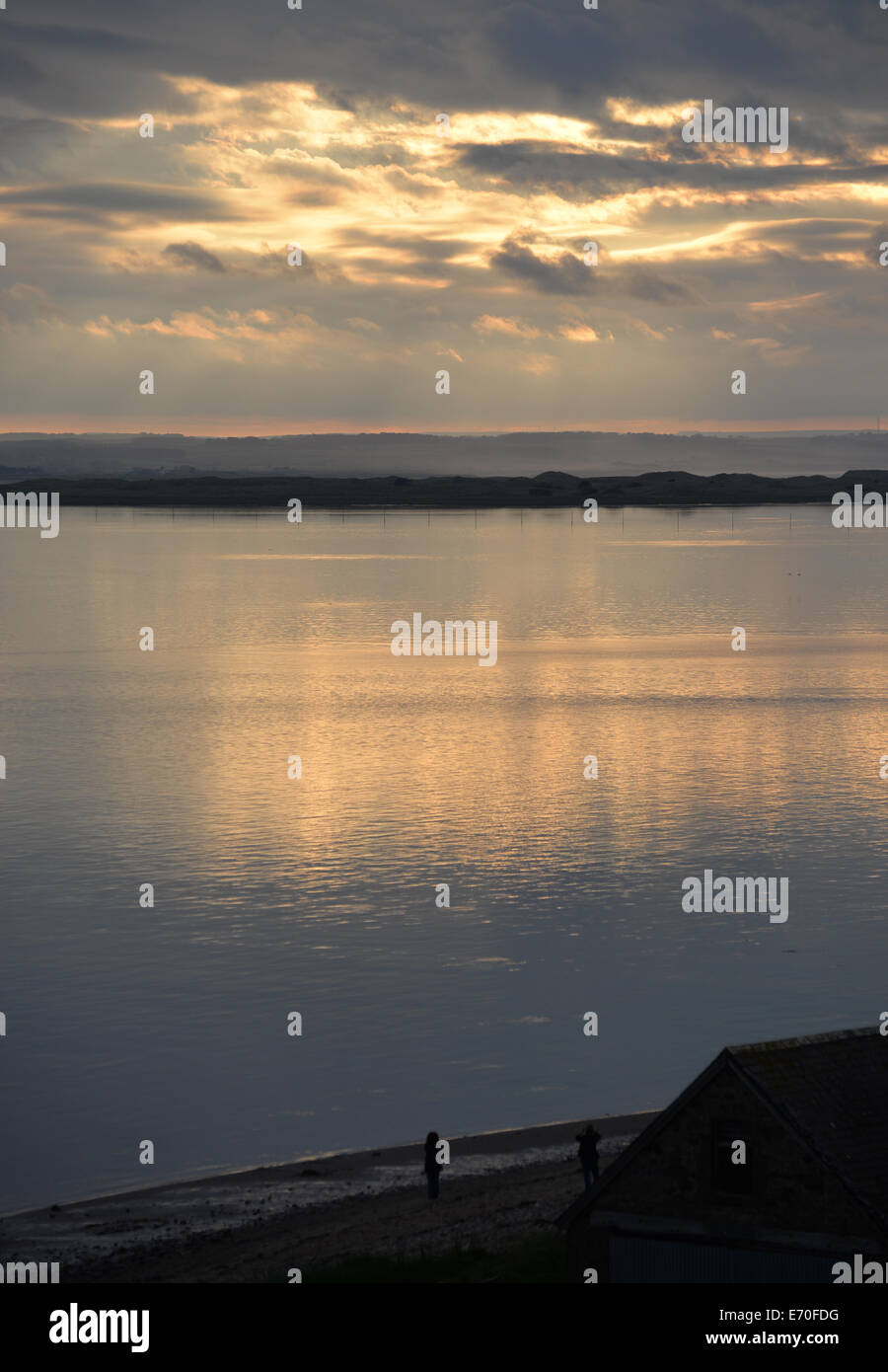 Holy Island: Clouds at Dusk Stock Photo - Alamy