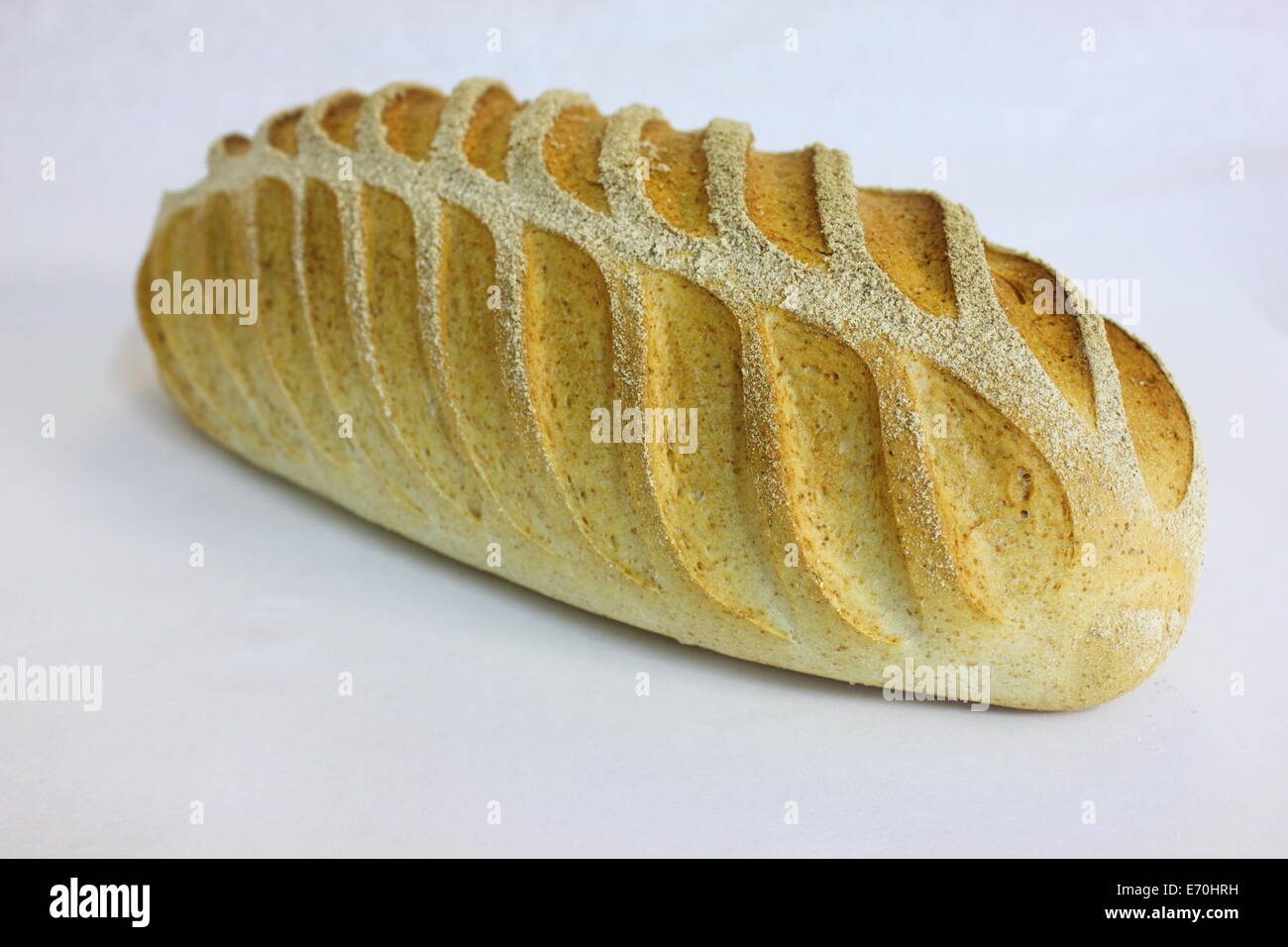 Rye bread baguette with superfine flour on top Stock Photo