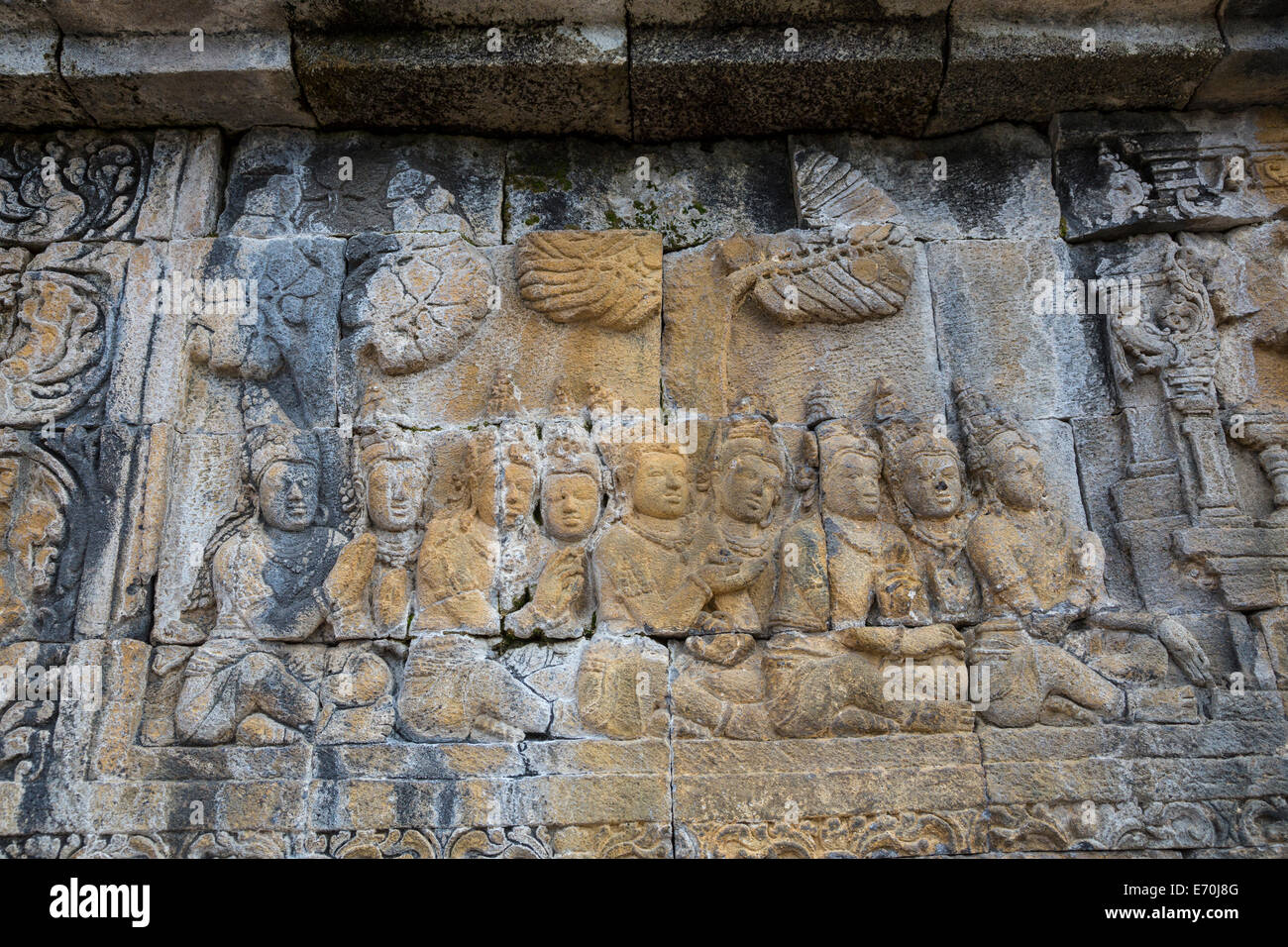 Borobudur, Java, Indonesia.  Bas-relief Stone Carving Showing Scenes from the Life of the Buddha. Stock Photo