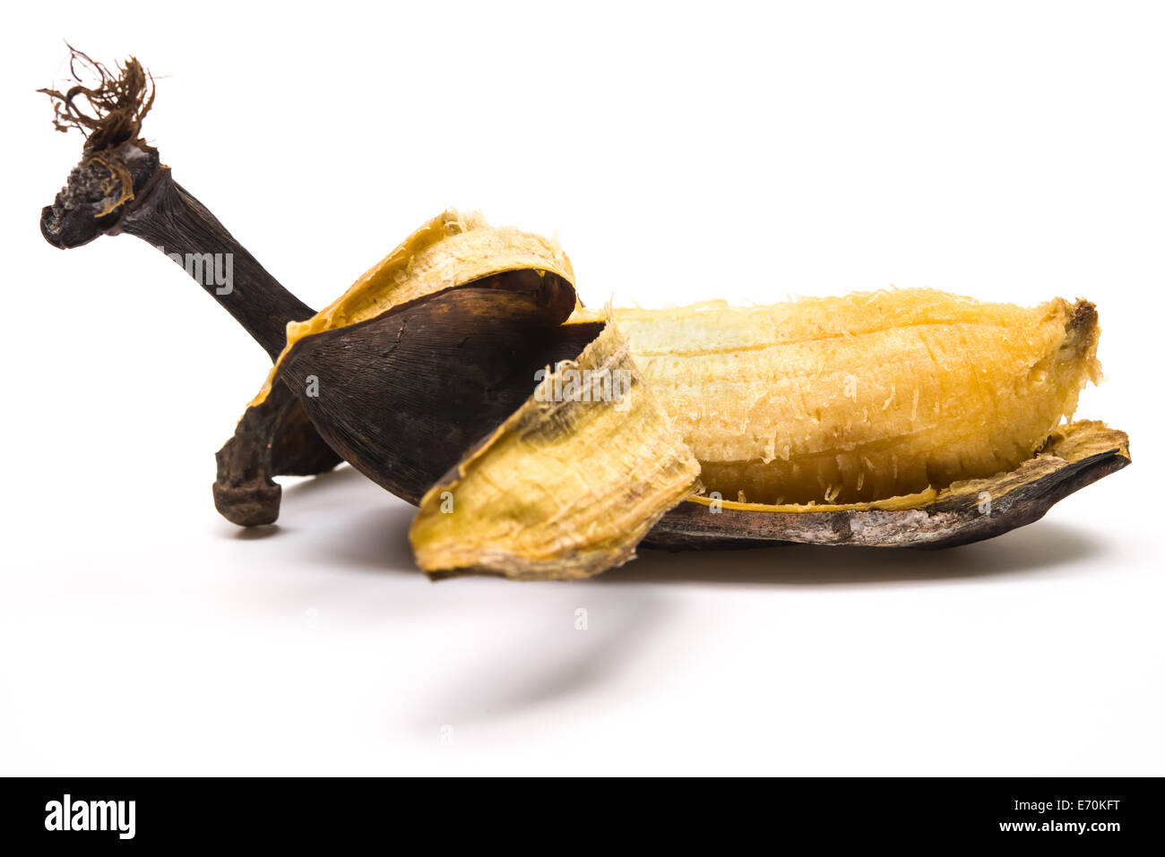 peeled overripe banana on a white background Stock Photo