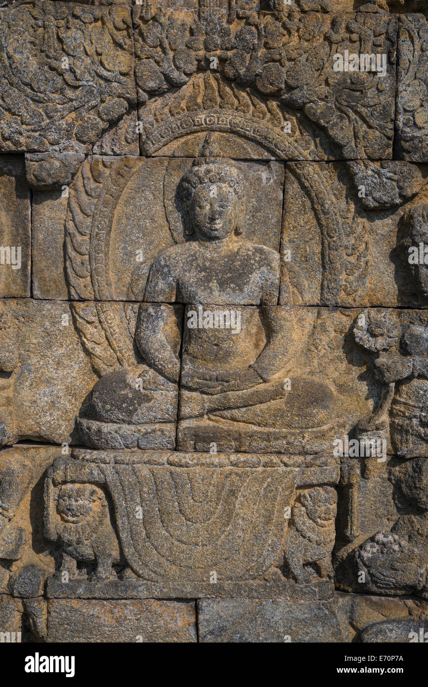 Borobudur, Java, Indonesia.  Bas-relief Carving, Buddha. Stock Photo