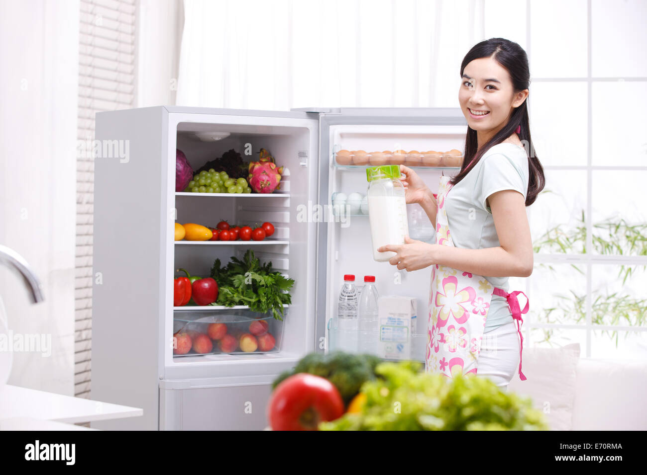 Milk in refrigerator stock photo. Image of container - 11894526