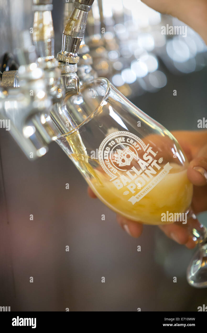 Pale Ale, Koelsch Style Ale is being poured in the tasting room of the