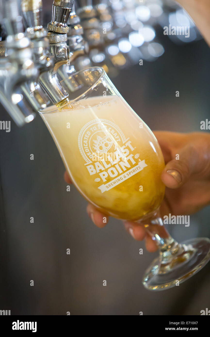 Pale Ale, Koelsch Style Ale is being poured in the tasting room of the