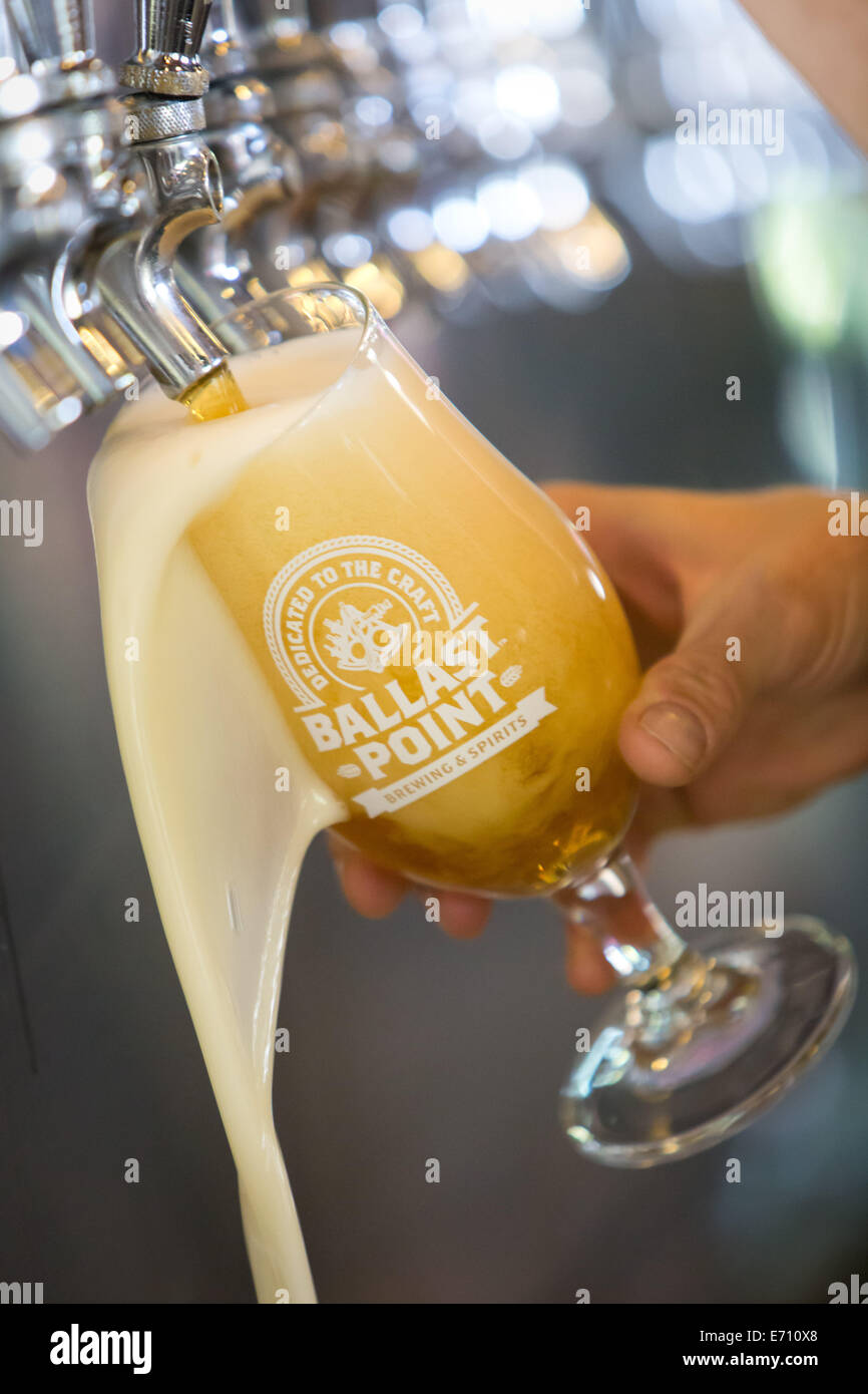 Pale Ale, Koelsch Style Ale is being poured in the tasting room of the