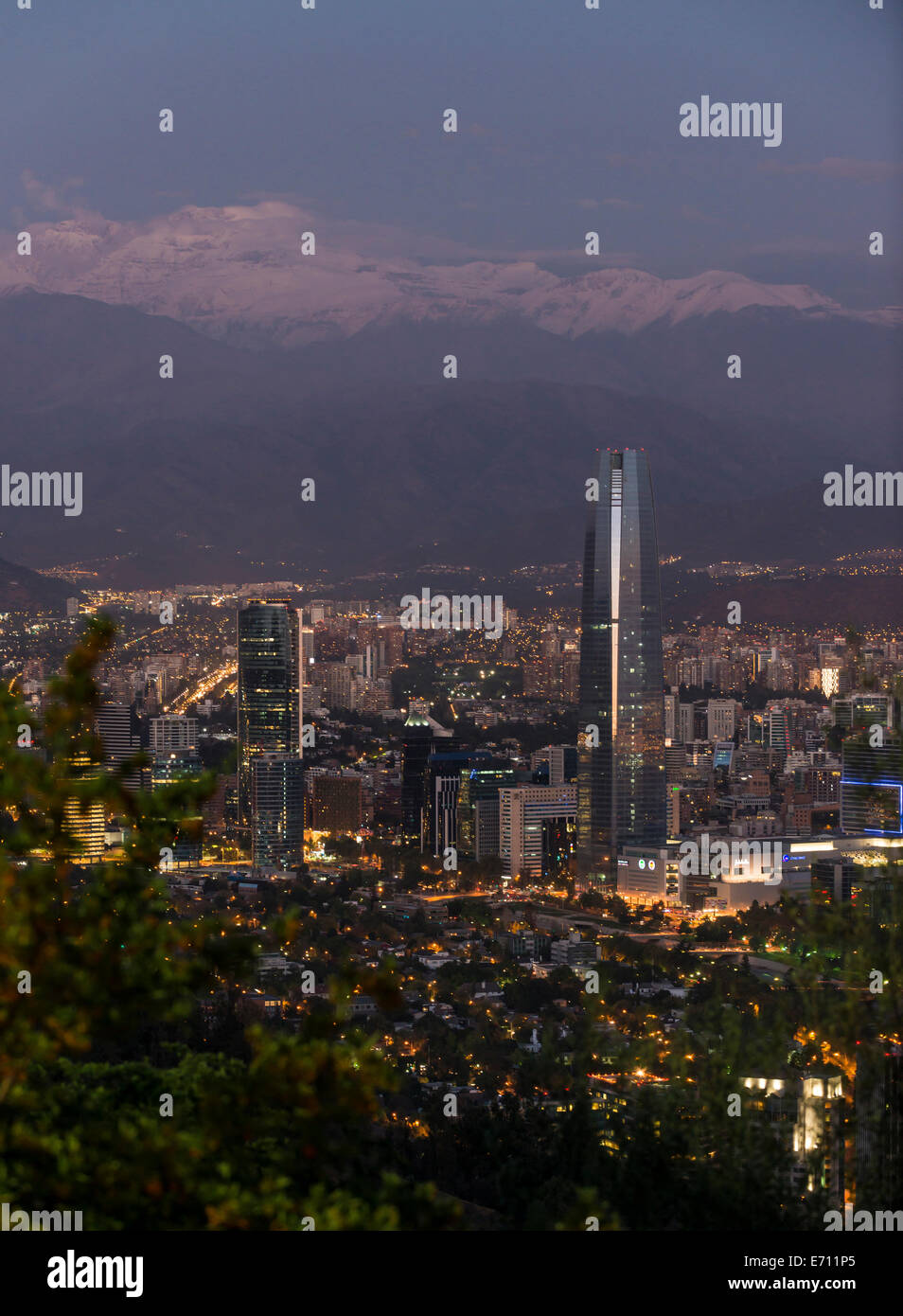 Providencia buildings and Gran Torre Santiago tower from Cerro San Cristobal hill at dusk, Santiago, Chile Stock Photo
