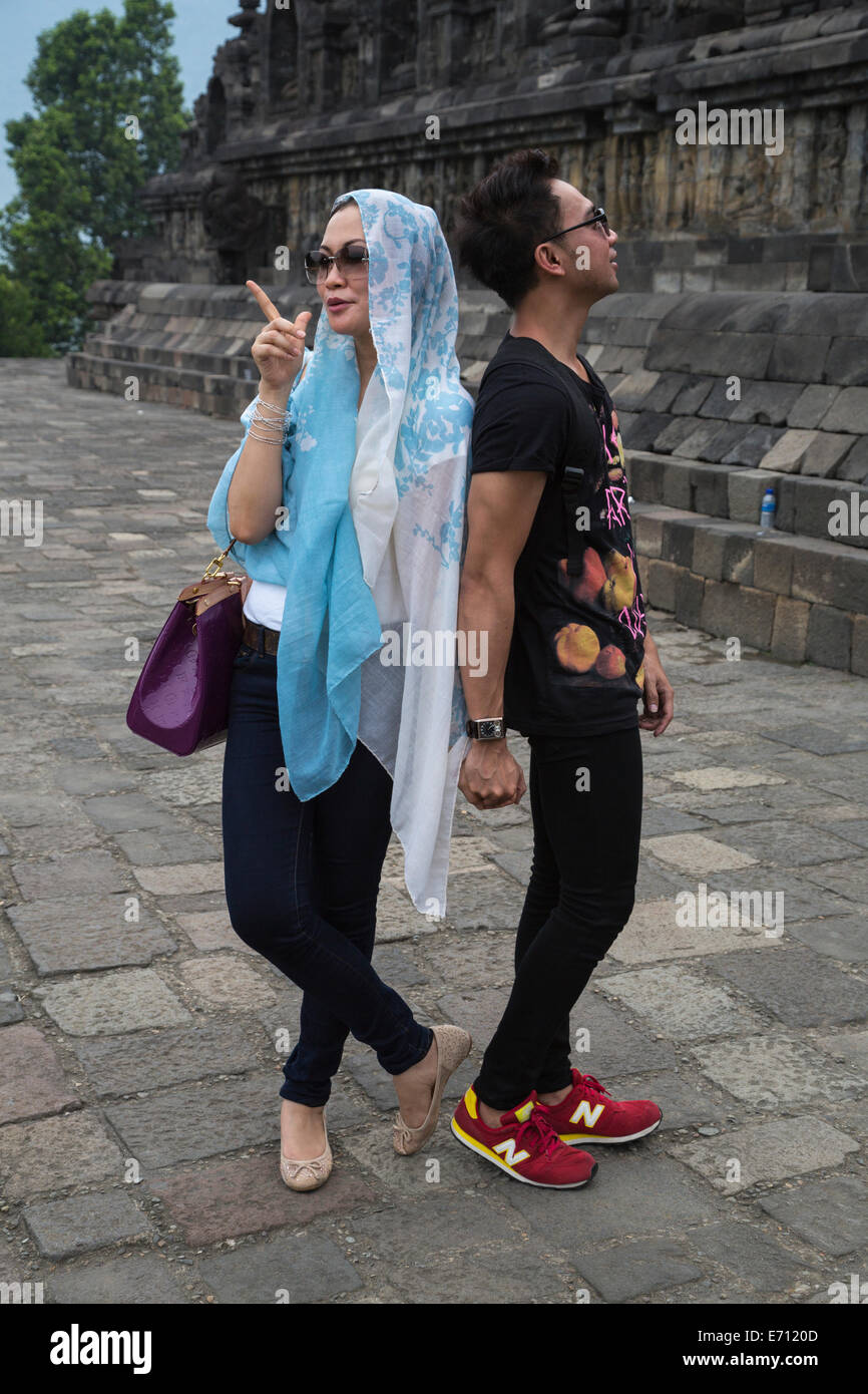 Borobudur, Java, Indonesia.  Young Indonesian Couple Posing for their Picture. Stock Photo