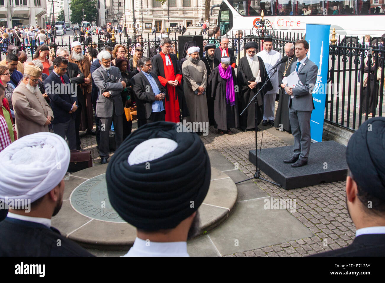 London, UK. 3rd September, 2014.   Leaders of different faiths meet at Westminster Abbey in London to hold a vigil for Iraq organised by World Jewish Relief, Islamic Relief, & Christian Aid, attended by the Most Rev & Rt Hon Justin Welby, Archbishop of Canterbury, Imam Ibrahim Mogra, Ayatollah Dr Sayed Fazel Milani,  Rabbi Laura Janner-Klausner and other senior religious leaders from across the country, where they unfurled a banner stating 'We are all human'. Pictured: Richard Verber of the World Jewish Relief Fund speaks to the gathering. Credit:  Paul Davey/Alamy Live News Stock Photo