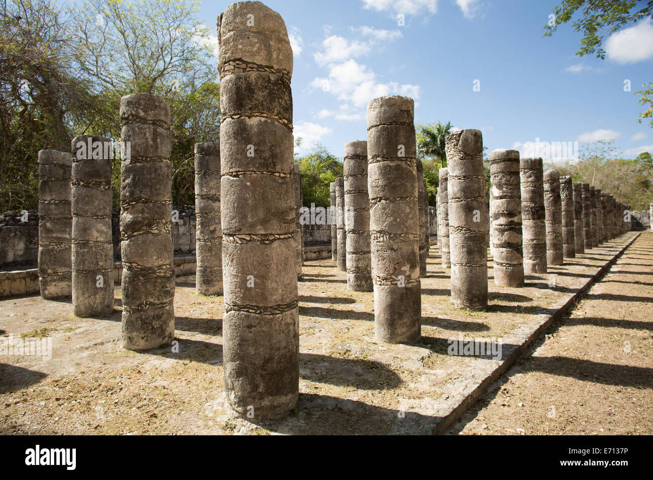 ancient round stone column rows on Mayan archaeological site Stock Photo