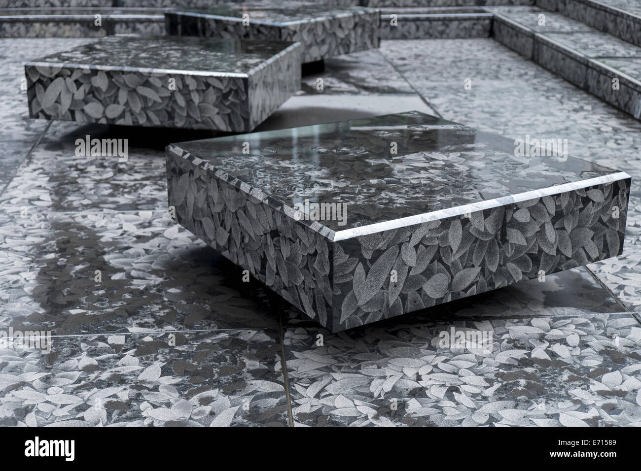 Japan, Tokyo, square stone blocks with leaf pattern Stock Photo