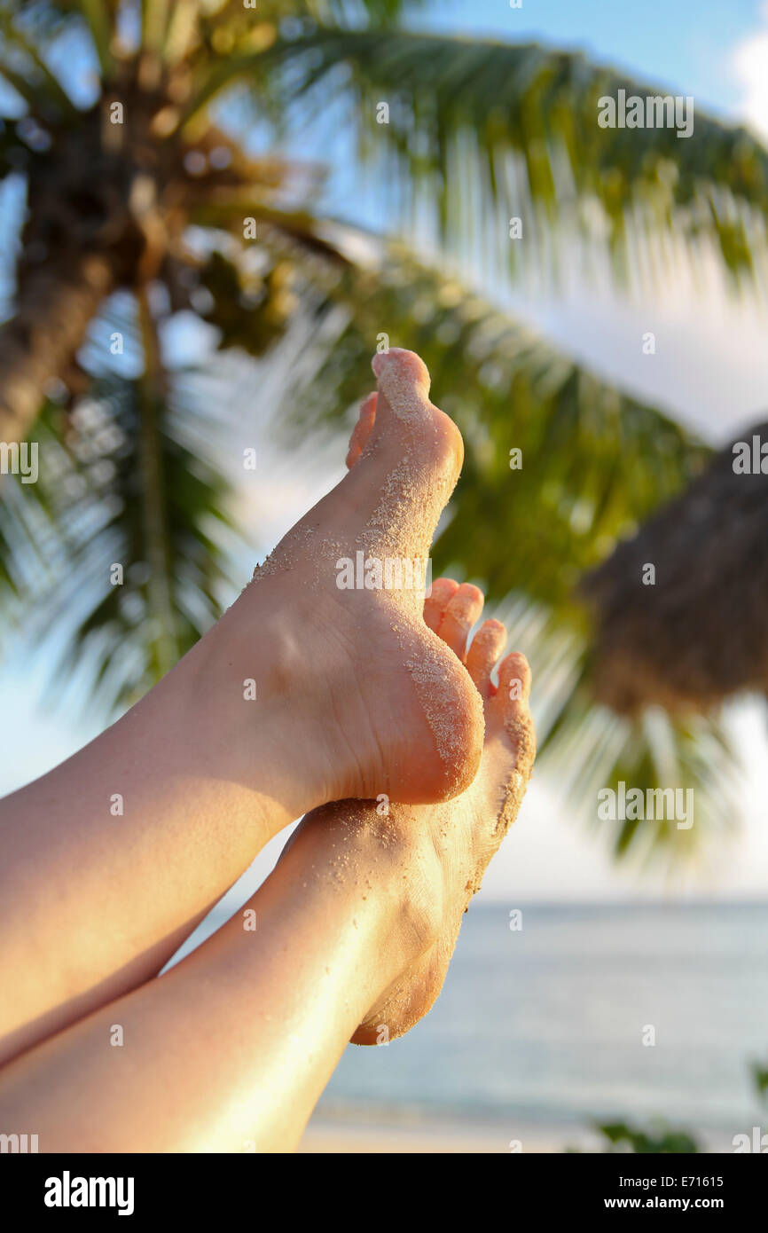 Seychelles, La Digue Island, Young woman relaxing at the Anse La Stock
