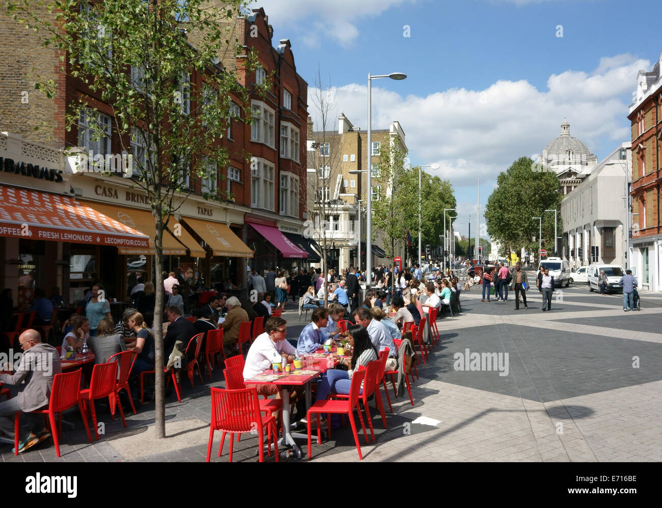 People having lunch 'al fresco' in Exhibition Road, South Kensington