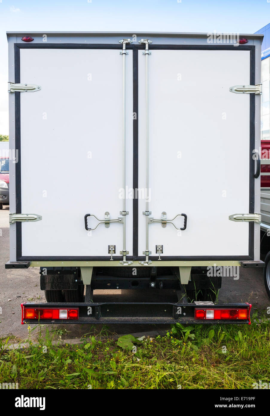 Rear view of new white cargo truck Stock Photo